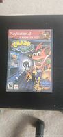 Front cover of PS2 Crash Bandicoot: The Wrath of Cortex Greatest Hits case