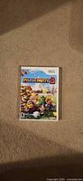 Front of Wii case showing Mario Party 8 cover art