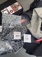 Close-up of Caldo aprons, Flair case, and loose apron