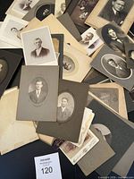 Spread of cabinet cards showing variety of mounts and portraits
