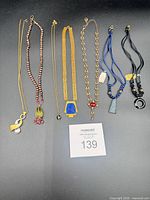 All six necklaces laid out for full view