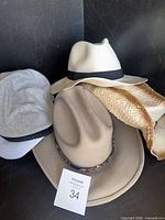 Group of four hats