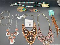 Group shot of all necklaces and earrings