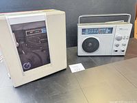 Front view showing SR-2400 radio and Sony Magic video recorder side by side