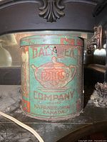 Front view showing Daly Tea Company logo and teapot graphic