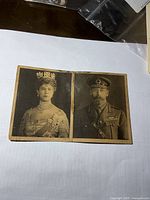 Full view of folded card showing both sepia portraits side by side