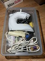 Top view of tote showing sewing machine, thread spools, cords and notions