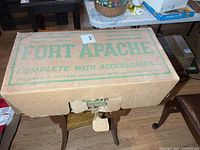 Closed Fort Apache cardboard box top view showing branding
