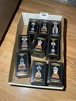 Tray with nine boxed NHL trophies