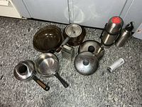 Full group of cookware, bakeware, thermos, bottle, grater, fondue pot, lids