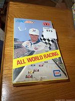 Top view of sealed All World Racing trading card box