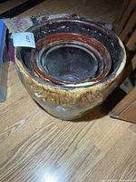 Four nested glazed ceramic planters