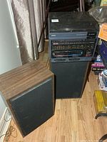 Stereo unit with one speaker visible