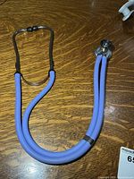 Full view of stethoscope showing tubing, binaurals and chestpiece