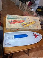 Speedboat in tray with illustrated box lid