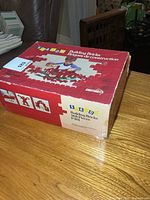 Closed StaLox box front and side panels visible