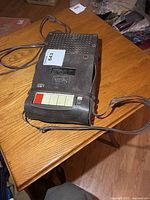 Recorder inside leather case showing overall condition