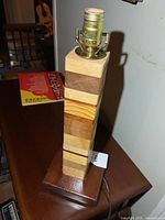 Full lamp base and socket, laminated wood body