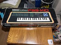 Closed box showing Yamaha PortaSound PSS-140 graphics