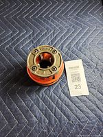 Top view showing RIDGID branding and die opening