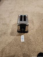 Front view of GE stainless toaster