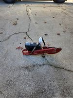 Full view of Hilti DS HS80 cut-off saw lying on pavement