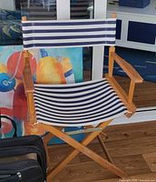 Wood director's chair with striped canvas seat/back