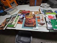 Front view of all paperback books laid out showing titles and cover art