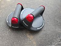 Pair of Perfect Pushup handles showing red caps and grips