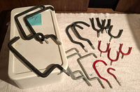 overview of all assorted screw-in hooks laid out