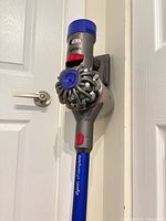 Dyson V7 main unit on wall dock