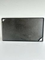 Flat side of rectangular cast iron griddle
