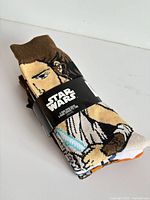 Front view of packaged Star Wars socks showing Princess Leia design