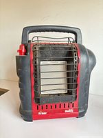 Front view showing ceramic burner tile, wire guard, brand marking