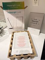 Lamp in molded tray with front of retail box