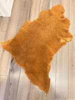 Curly fleece side of sheepskin hide