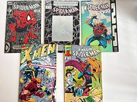 Group shot of all five comics