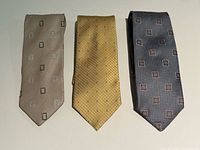 Front view of all three ties showing colors and patterns
