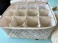 Zippered floral carrier with cardboard dividers