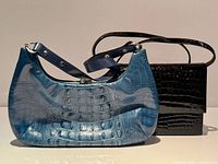 Front view of both handbags