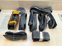 Group shot of nine coiled road tires on countertop