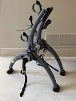 Three-leg gray Saris Bones rack side view showing overall structure