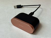 Closed charging case with USB cable
