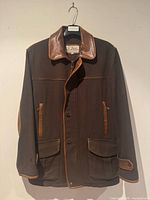 Front view of jacket showing overall design and pockets