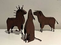 Group view of bull, dog and horse sculptures