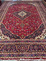 Full view of the entire rug showing design and colors