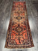 Full view of entire runner rug showing pattern and colors