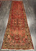 Full view of Persian runner rug showing complete design