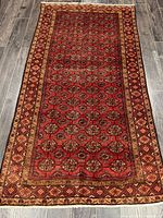 Full view of Turkman rug showing overall design and size