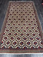 Full view of entire Arak rug showing overall pattern and borders